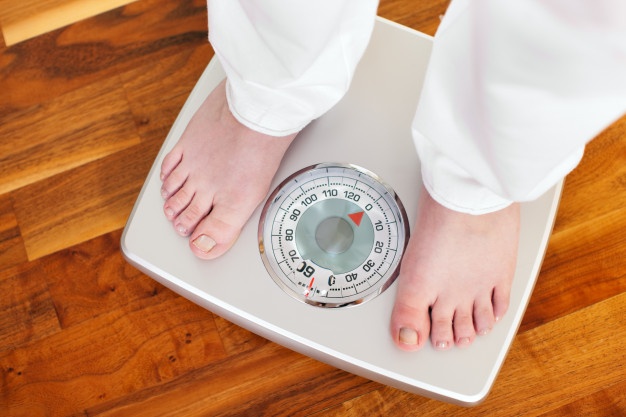 How often should I weigh myself while I am trying to lose weight